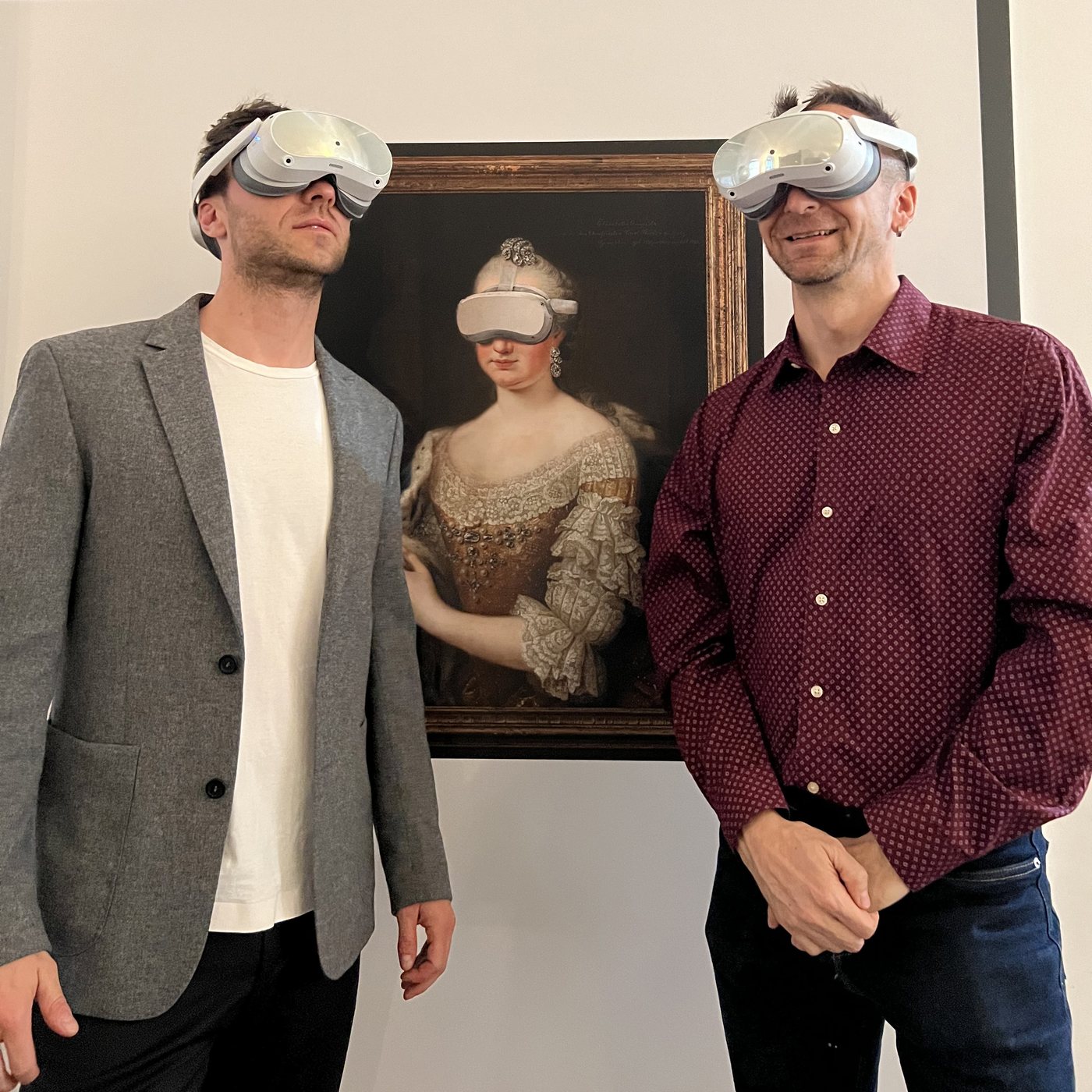 The Electress’s Library in VR — wearing headsets in front of the Electress’s portrait